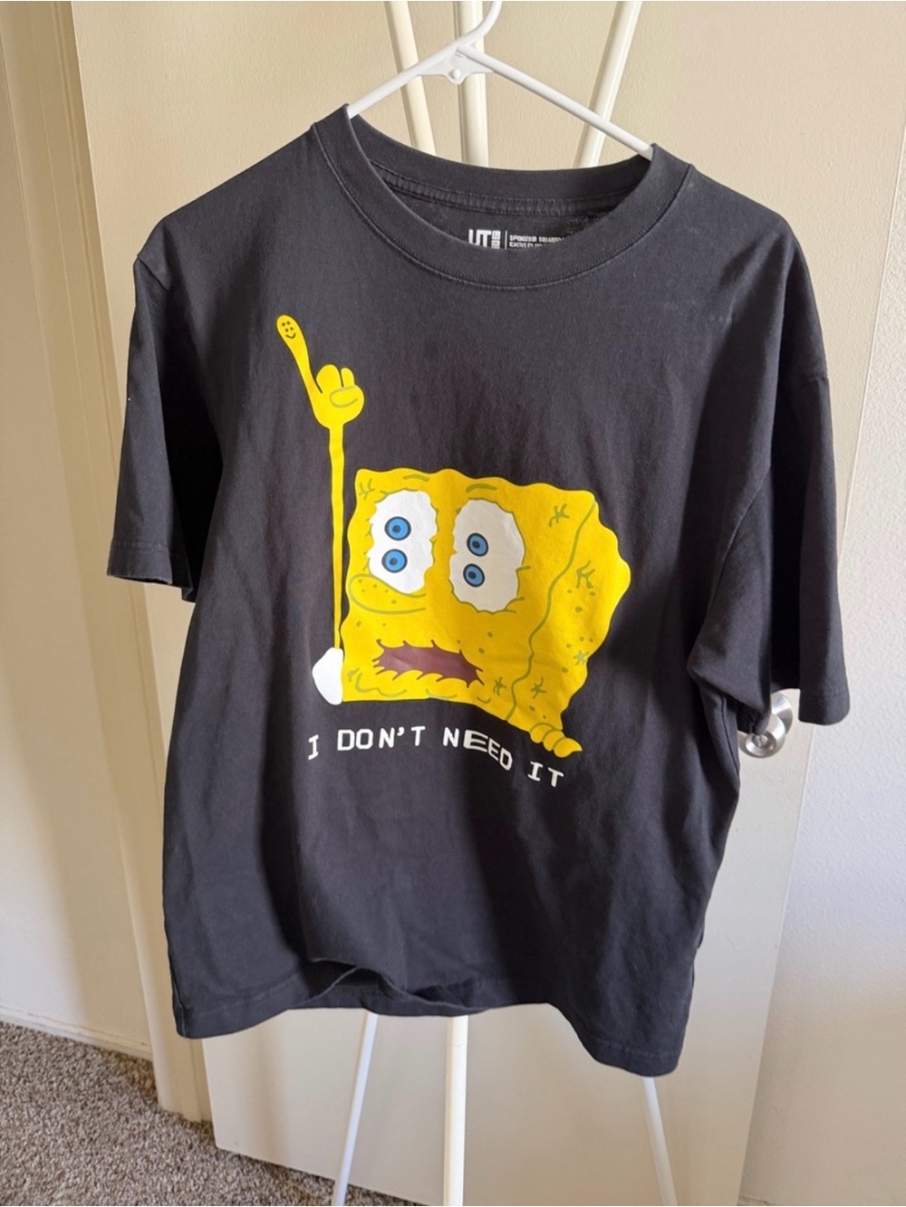 Uniqlo Black Short-Sleeve Tee with Yellow Cartoon Graphic